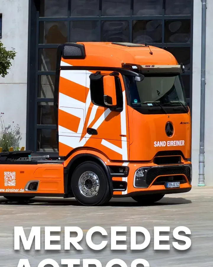 Mercedes Actros in Orange mit weißen Streifen und Eireiner-Beschriftung